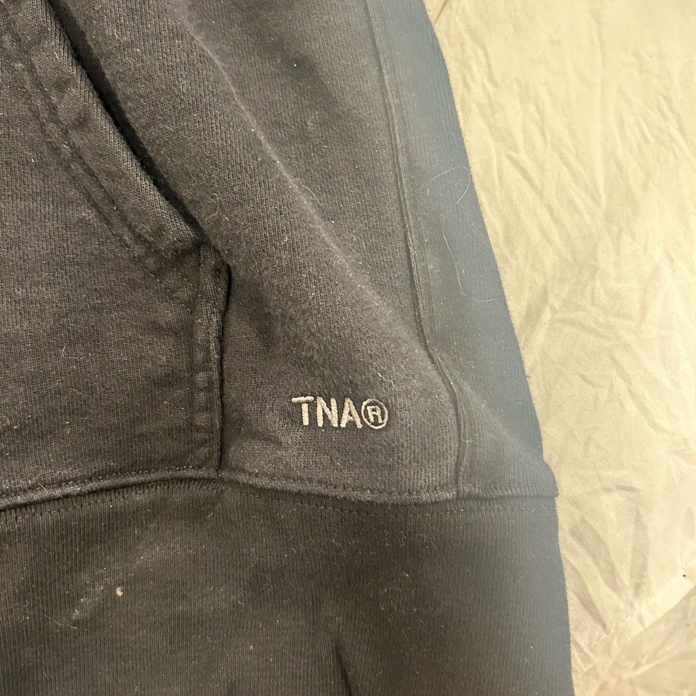 Size small TNA, black hoodie, worn once